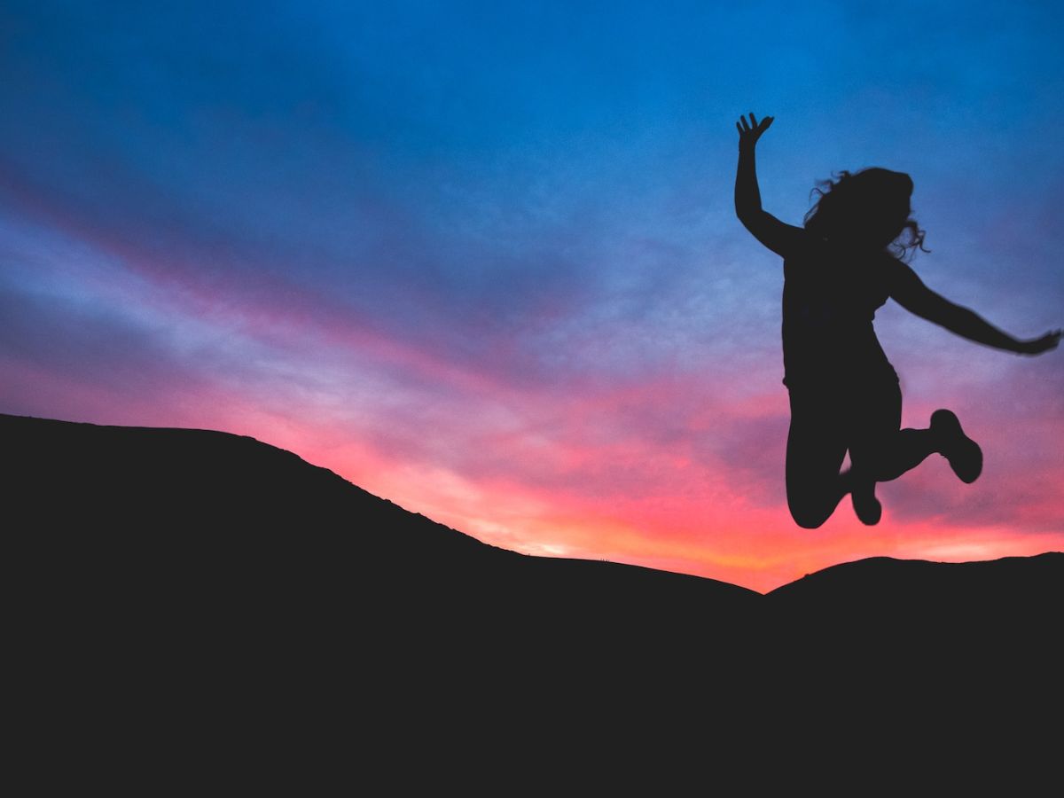 Big jump into a coloful sky